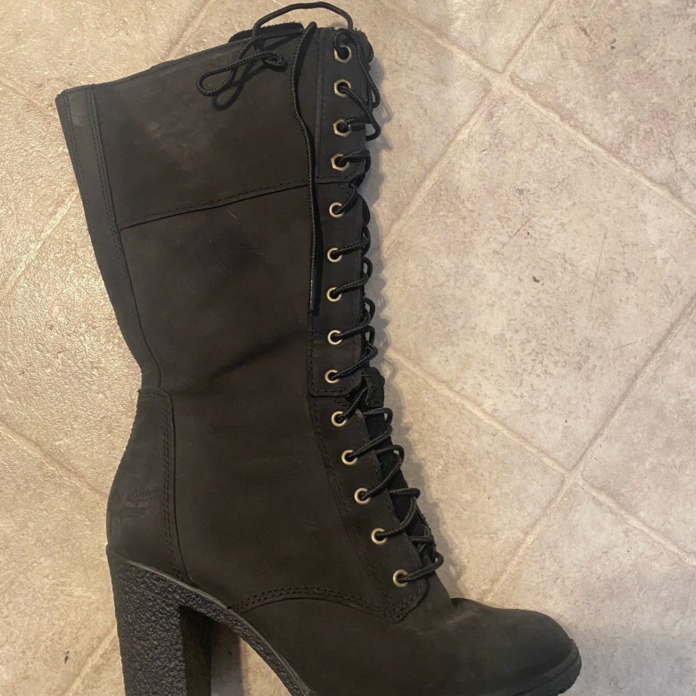 Mid length lace up leather boots